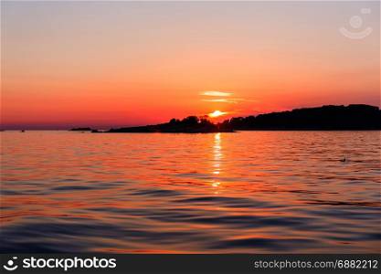 Sunset at sea in Rovinj bay, Istria, Croatia