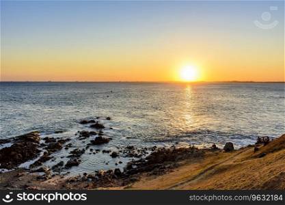 Sunset at the Barra lighthouse in the city of Salvador with a view of All Saints bay. Sunset at the Barra lighthouse in Salvador