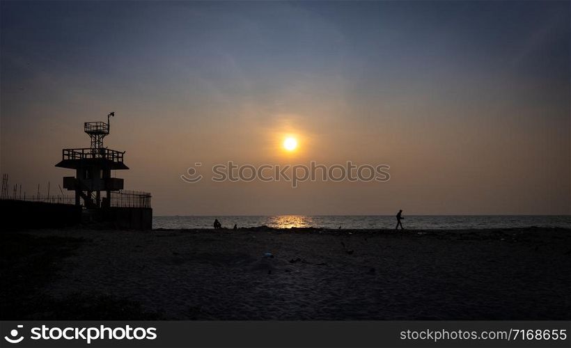 Sunset at the beach adjacent to Vypin Lighthouse, Kochi, Kerala, India