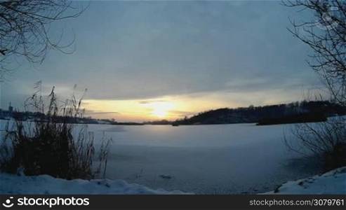 Sunset at The Lake In Winter