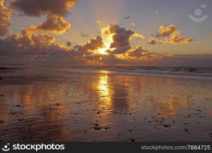 Sunset at the North Sea coast in the Netherlands