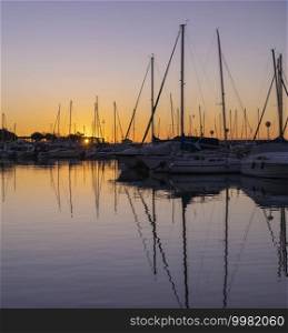 sunset at the port of portixol, in palma de mallorca