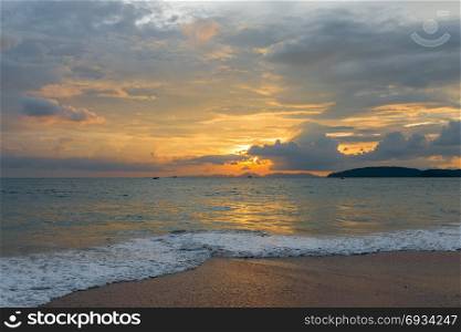 sunset at the resort of Krabi in Thailand, a beautiful landscape with an orange sky