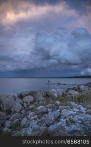 Sunset at the sea. It&rsquo;s raining