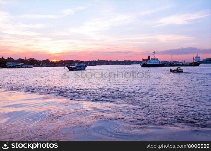 Sunset at the Yangon river in Yangon Myanmar