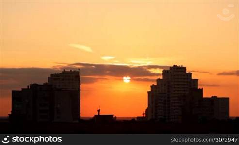 sunset between two large buildings