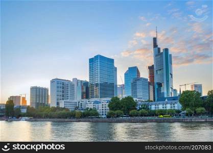 Sunset by the riverside with business district modern architecture, Frankfurt-am-Main, Germany