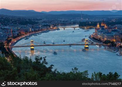 Sunset Cityscape Budapest along Danube with Chain Bridge and Parliament Building. Sunset Budapest along Danube with Chain Bridge and Parliament Building