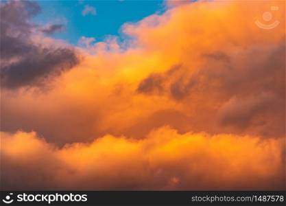 Sunset clouds orange and pastel color. Sky background. Sunset clouds orange and pastel color.