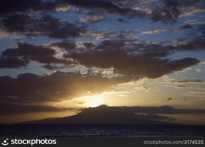 Sunset clouds over the coast of Kihei, Maui, Hawaii, USA.