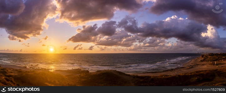 Sunset dream of romantic travel to seashore of Israel