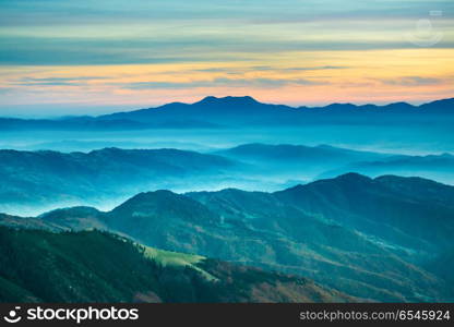 Sunset in blue mountains. Beautiful landscape with sunset in blue mountains