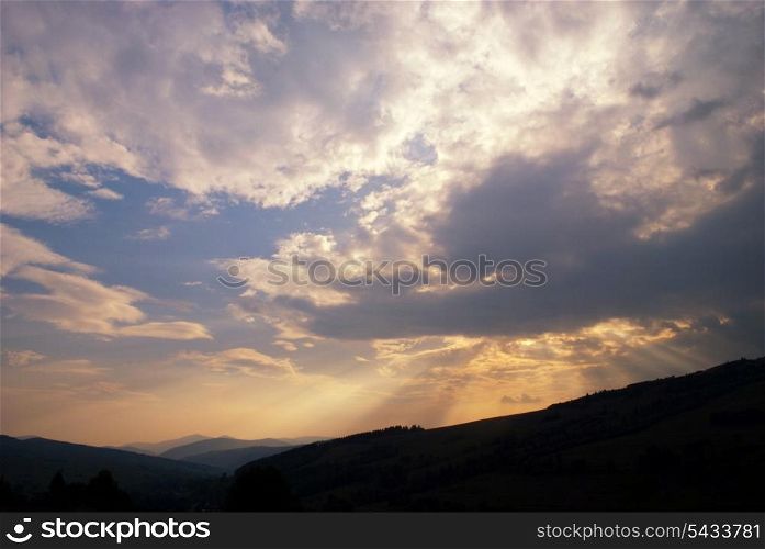 Sunset in Carpatian mountains in summer