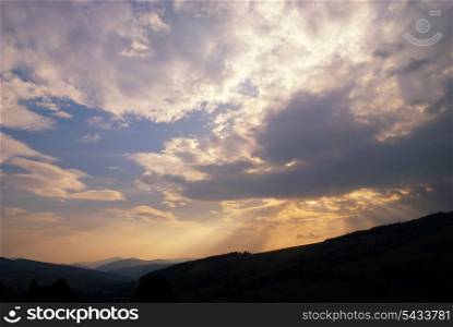 Sunset in Carpatian mountains in summer