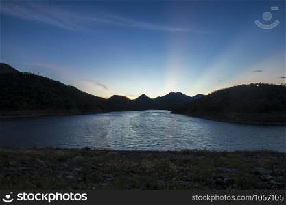 Sunset in mountains and lake,Landscape background