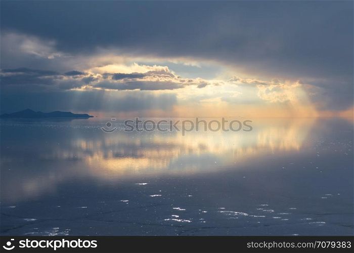 Sunset in Salar de Uyuni salt flats desert, Andes Altiplano, Bolivia