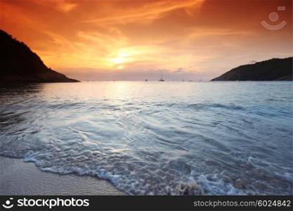 Sunset in Thailand. Beautful landscape with sea beach and mountains under sunset sky in Thailand