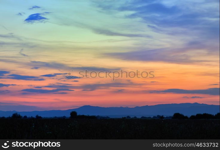 Sunset in the Carpathian mountains from countryside