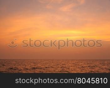 sunset in the evening. Orange sky at dusk in the sea.