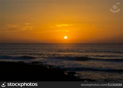 sunset in the ocean in a beach in Portugal, texture pattern background