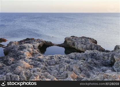 Sunset in the sea bay with rocks, Tarkhankut, Crimea, Ukraine&#xA;