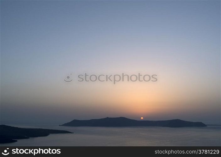 Sunset in Thira at Santorini island in Greece.