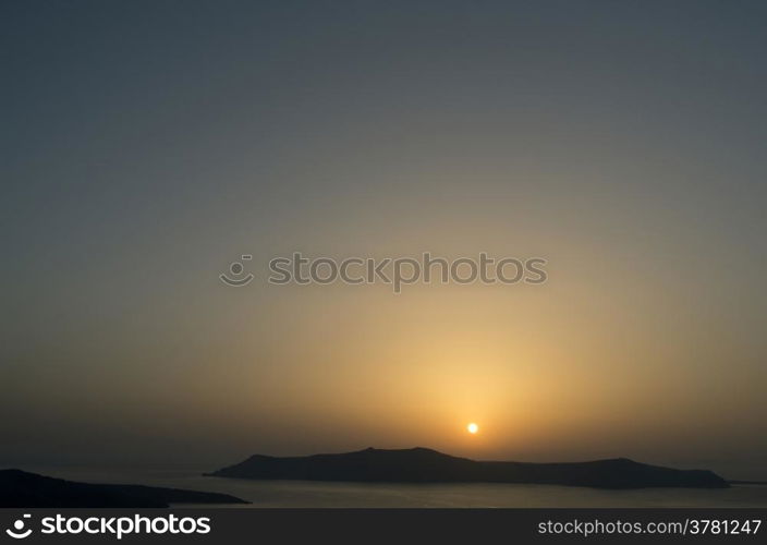 Sunset in Thira at Santorini island in Greece.