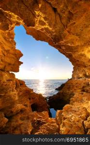 Sunset into grotto. Nature composition.