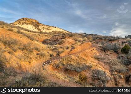Sunset light over single track trail (Salt Lick) in Red Mountain Open Space in northern Colorado l