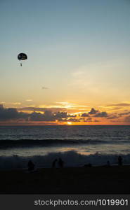 Sunset moment beach landscape with tourism