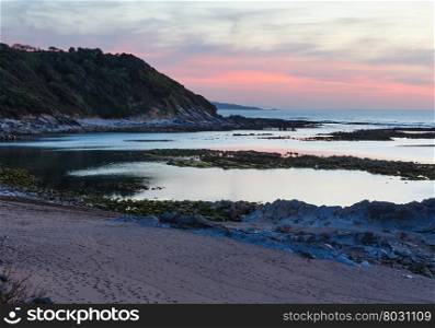 Sunset ocean coast view from beach (near Saint-Jean-de-Luz, France, Bay of Biscay).