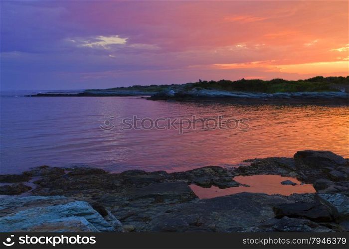 Sunset on a rocky shore. Sunset on a rocky shore.