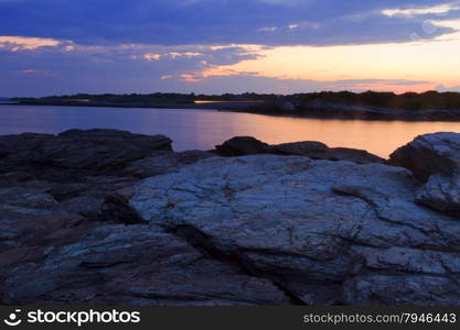 Sunset on a rocky shore. Sunset on a rocky shore.