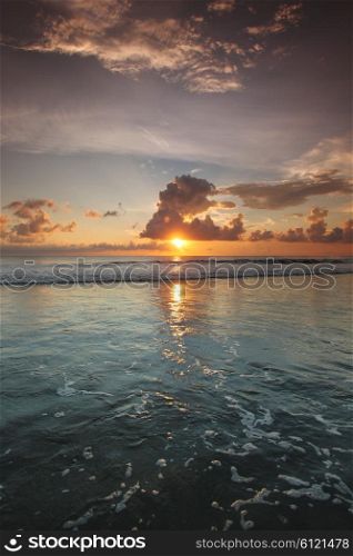 Sunset on Bali. Radiant sea beach sunset on Bali