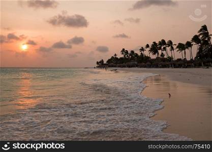 Sunset on Druif beach on Aruba island in the Caribbean Sea