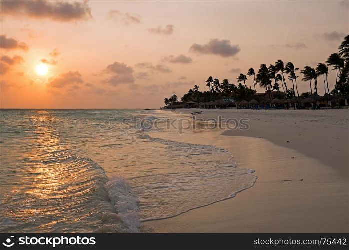 Sunset on Druif beach on Aruba island in the Caribbean Sea