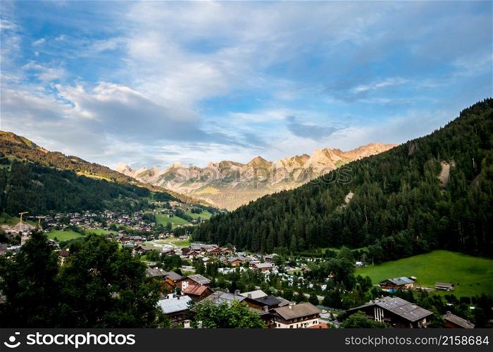 Sunset on The Grand-Bornand village and the Aravis mountain range, France. Sunset on The Grand-Bornand village and the Aravis mountain range