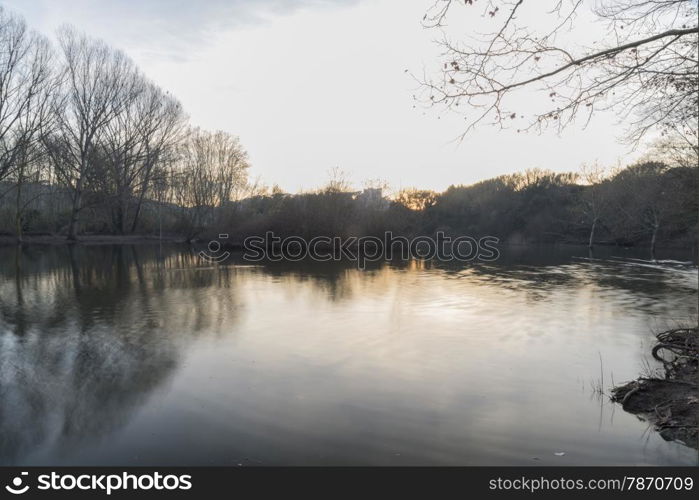 sunset on the lake in the Roca Del Valles