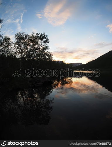 sunset on the mountain lake