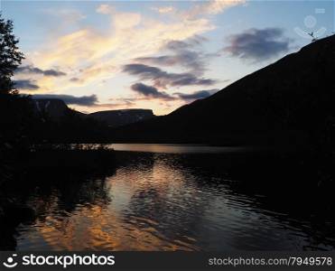sunset on the mountain lake