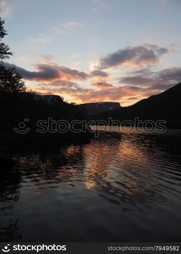 sunset on the mountain lake