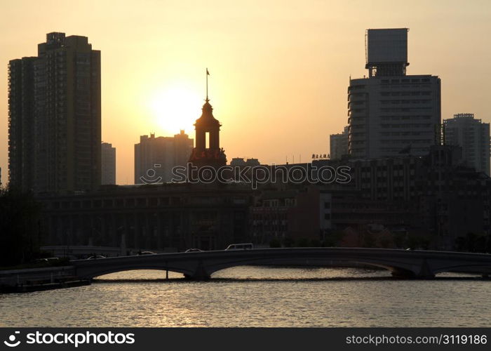 Sunset on the river in Shanghai, China