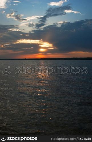 sunset on the river in summer