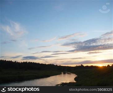 sunset on the river in the Ural