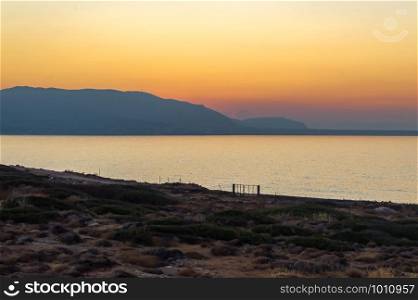 Sunset on the sea near the village of Sissi in Crete