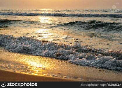 sunset on the sea, sea waves red from sunlight. sea waves red from sunlight, sunset on the sea