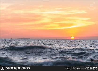 Sunset on the sea with Rocks stone