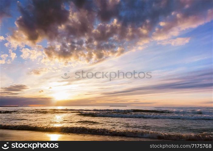 sunset on the seashore, the sky is purple from the sunset. the sky is purple from the sunset, sunset on the seashore