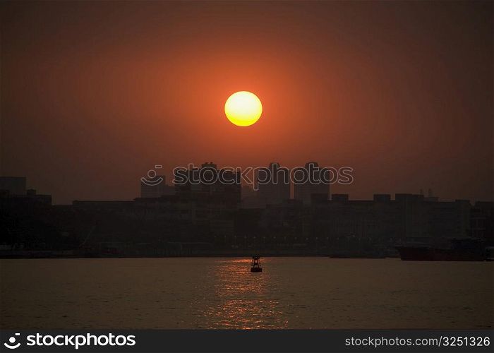 Sunset over a city, Shamian Island, Guangzhou, Guangdong Province, China