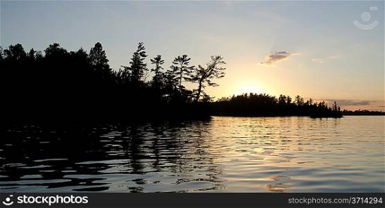 Sunset over a lake, Lake of the Woods, Ontario, Canada